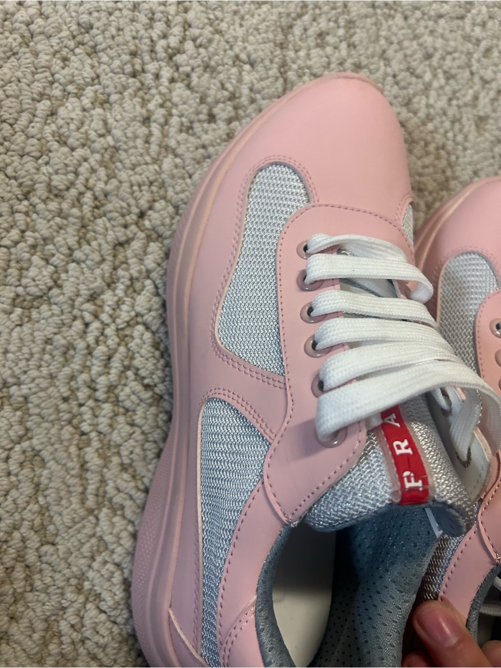 Pink and white sneakers
